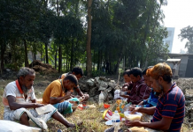 Way Out from Overwhelming Employment Precarity in Bangladesh Construction workers having lunch.